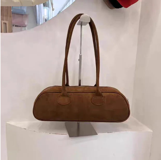 Simple suede baguette bag for women, fashionable and versatile Arc de Triomphe underarm bag for women, retro plush new shoulder bag